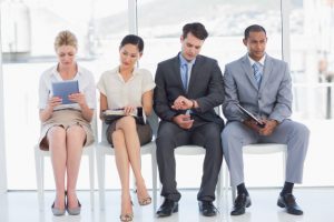 business-people-waiting-for-job-interview-in-office_13339-85453